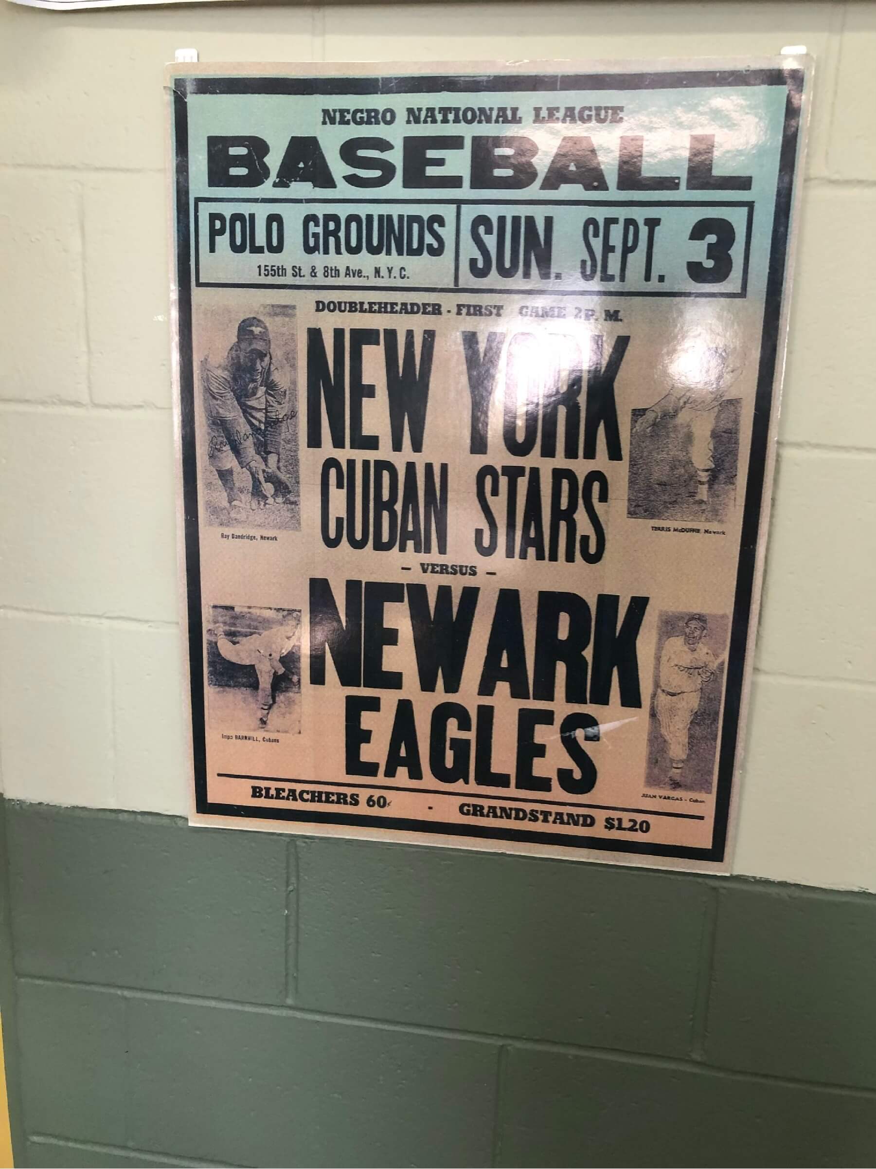 A vintage Negro National League poster for a doubleheader at the Polo Grounds featuring the New York Cuban Stars versus the Newark Eagles.