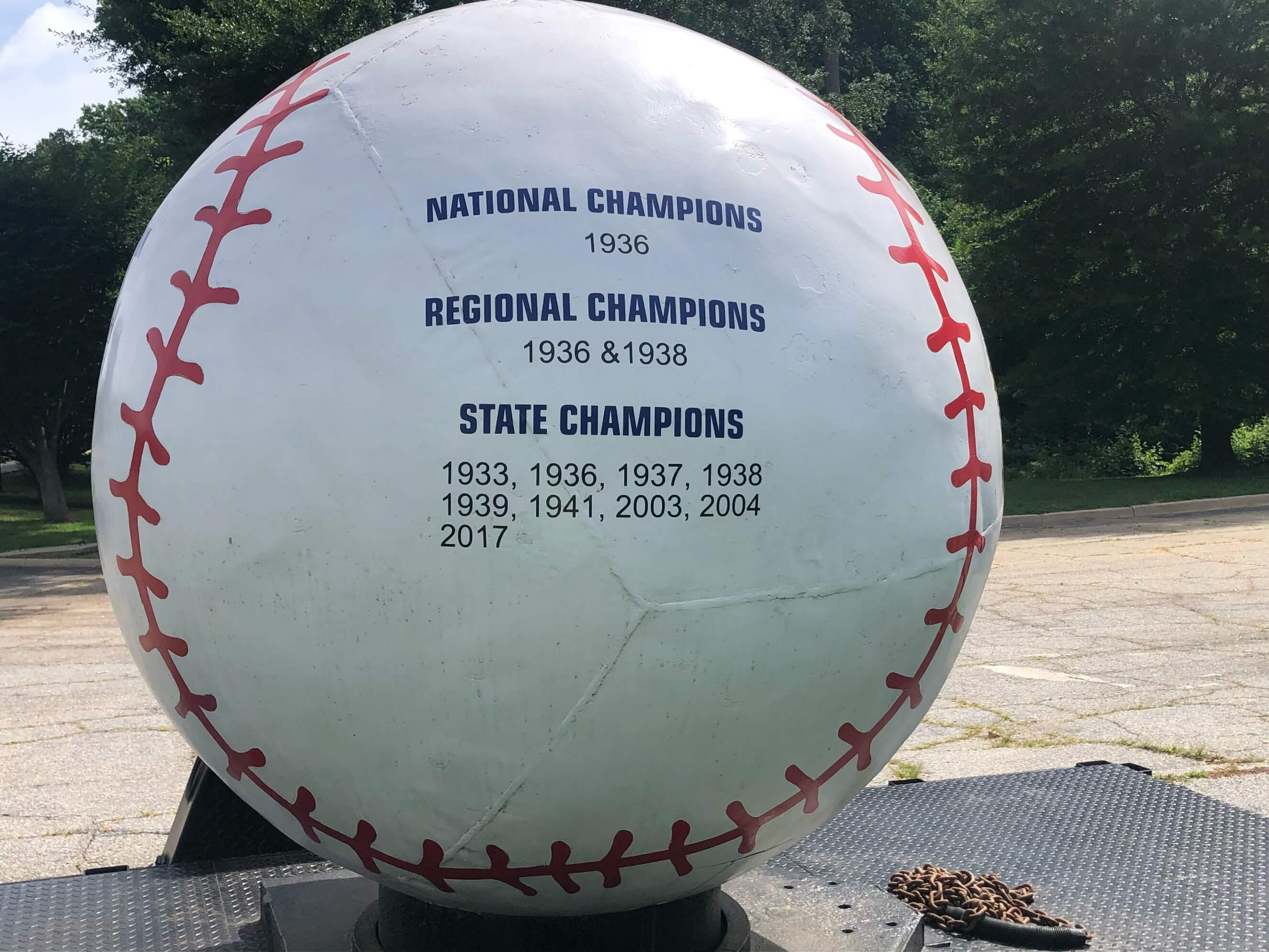 Giant baseball monument at Duncan Park Stadium listing Spartanburg American Legion Post 28 championships: National Champions 1936, Regional Champions 1936 and 1938, and State Champions in 1933, 1936, 1937, 1938, 1939, 1941, 2003, 2004, and 2017.